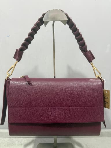 Borsa bordeaux in pelle con manico intrecciato