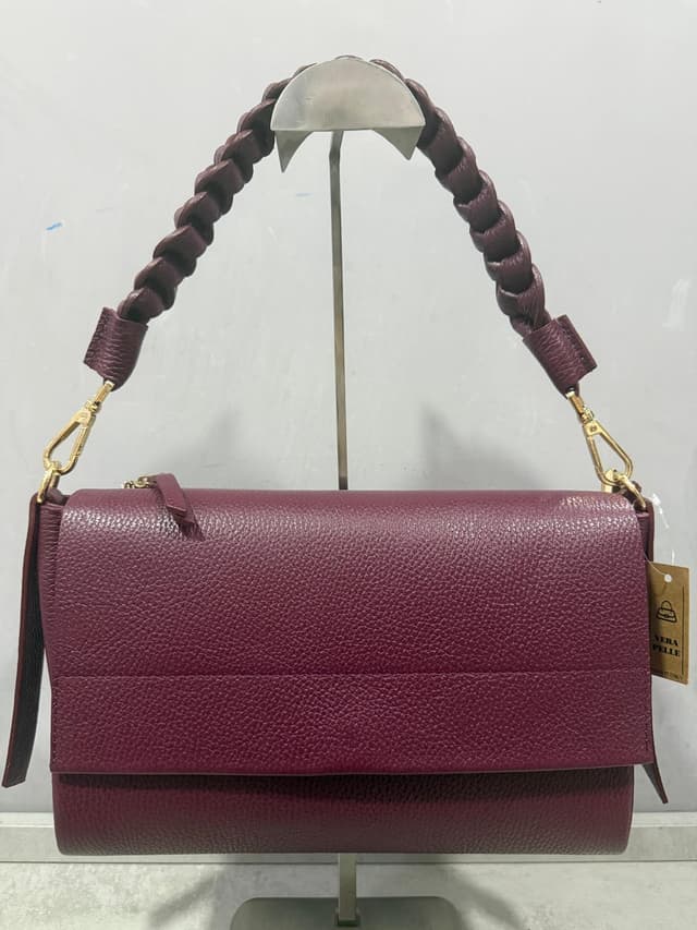 Borsa bordeaux in pelle con manico intrecciato